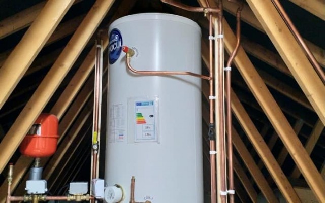 05 - K & L Heating & Bathroom Projects - Large boiler Installation in Loft